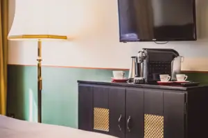 A television on a cabinet.