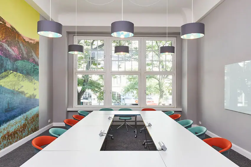 A coworking space with a table and chairs.