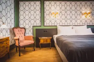 Bed and chair in one room