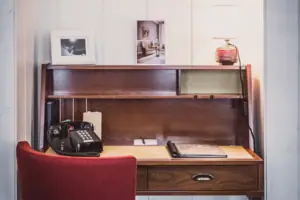 Desk with chair and telephone